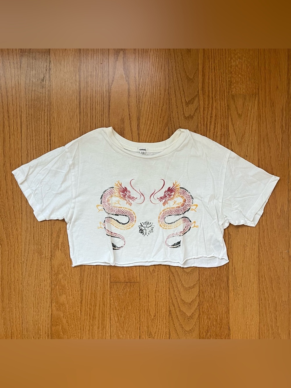 Garage white cropped tee with dragons graphic, size XS